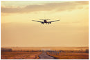 Cuadro Decorativo Avión aterrizando en atardecer